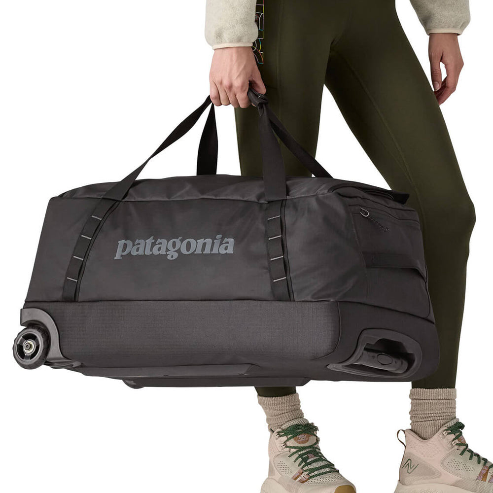 
                      
                        Patagonia Duffel Wheeled MD Black Hole purple dulse mauve
                      
                    