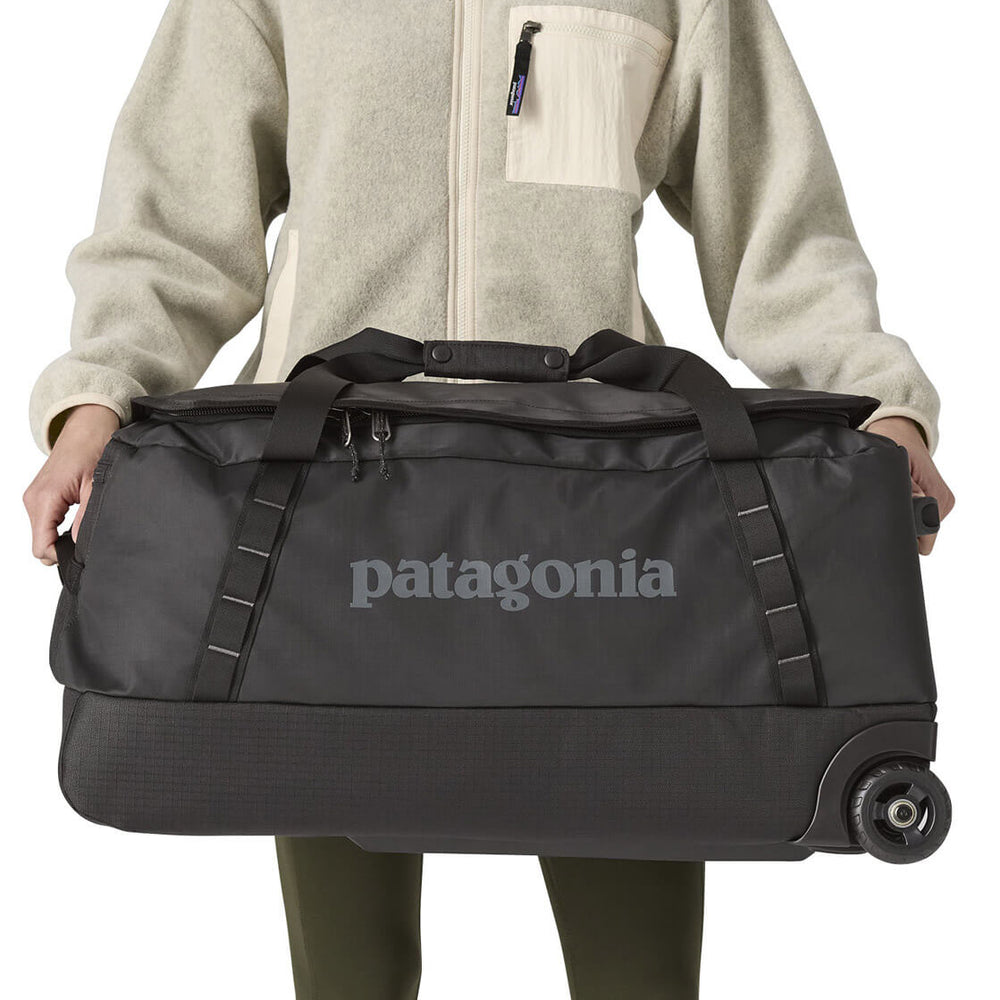 
                      
                        Patagonia Duffel Wheeled MD Black Hole purple dulse mauve
                      
                    