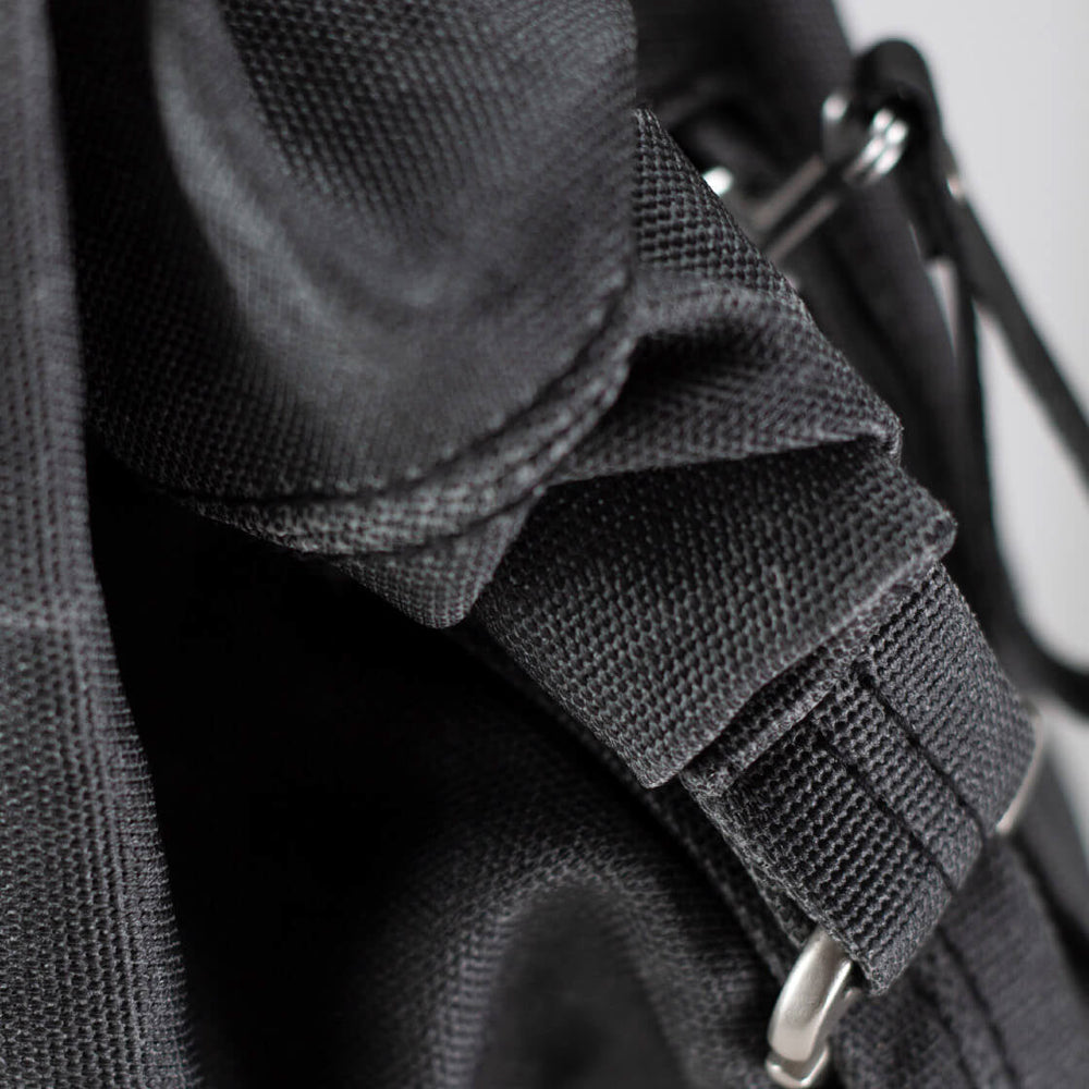 
                      
                        Qwstion Backpack Roll Pack black waxed
                      
                    