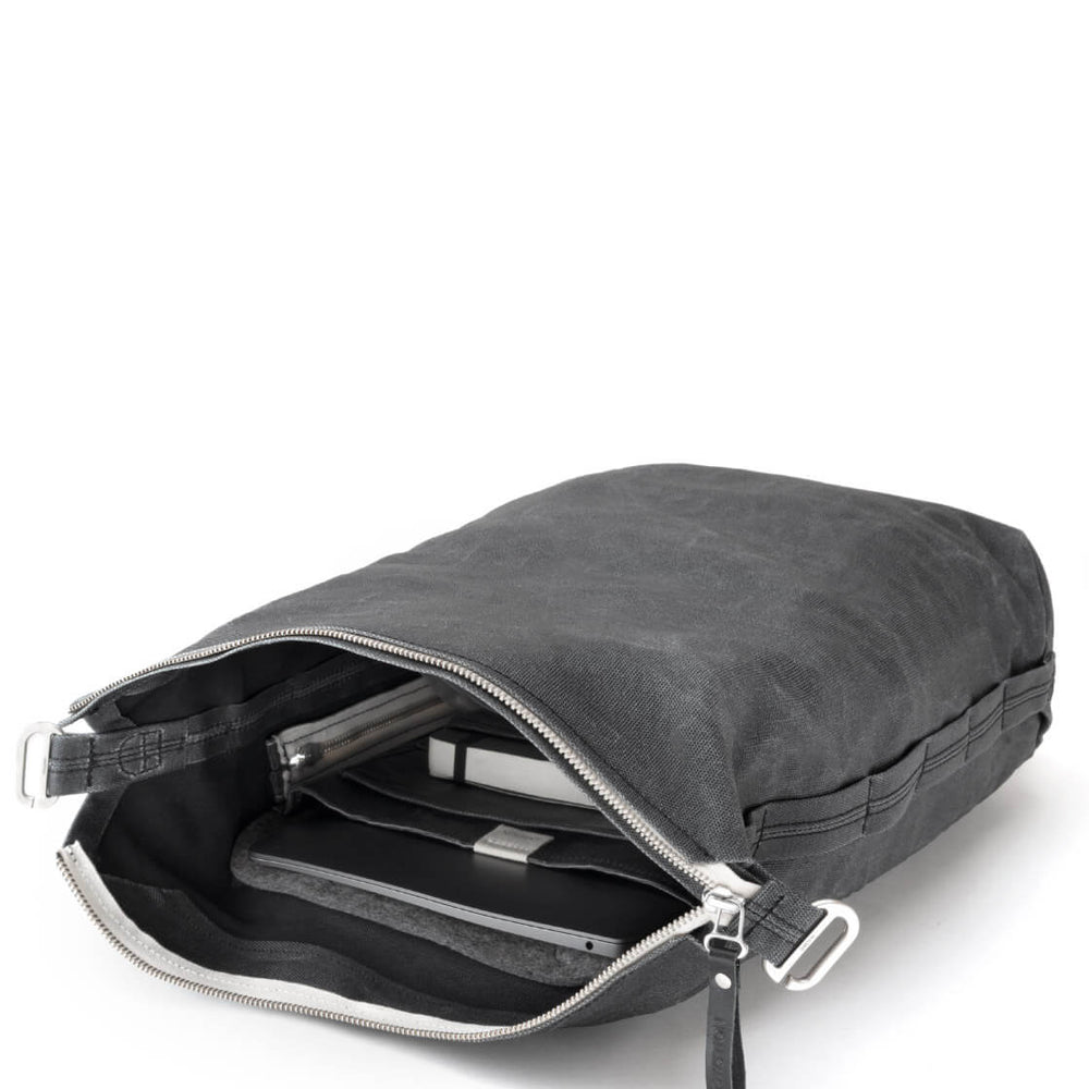 
                      
                        Qwstion Backpack Zip Pack black waxed
                      
                    