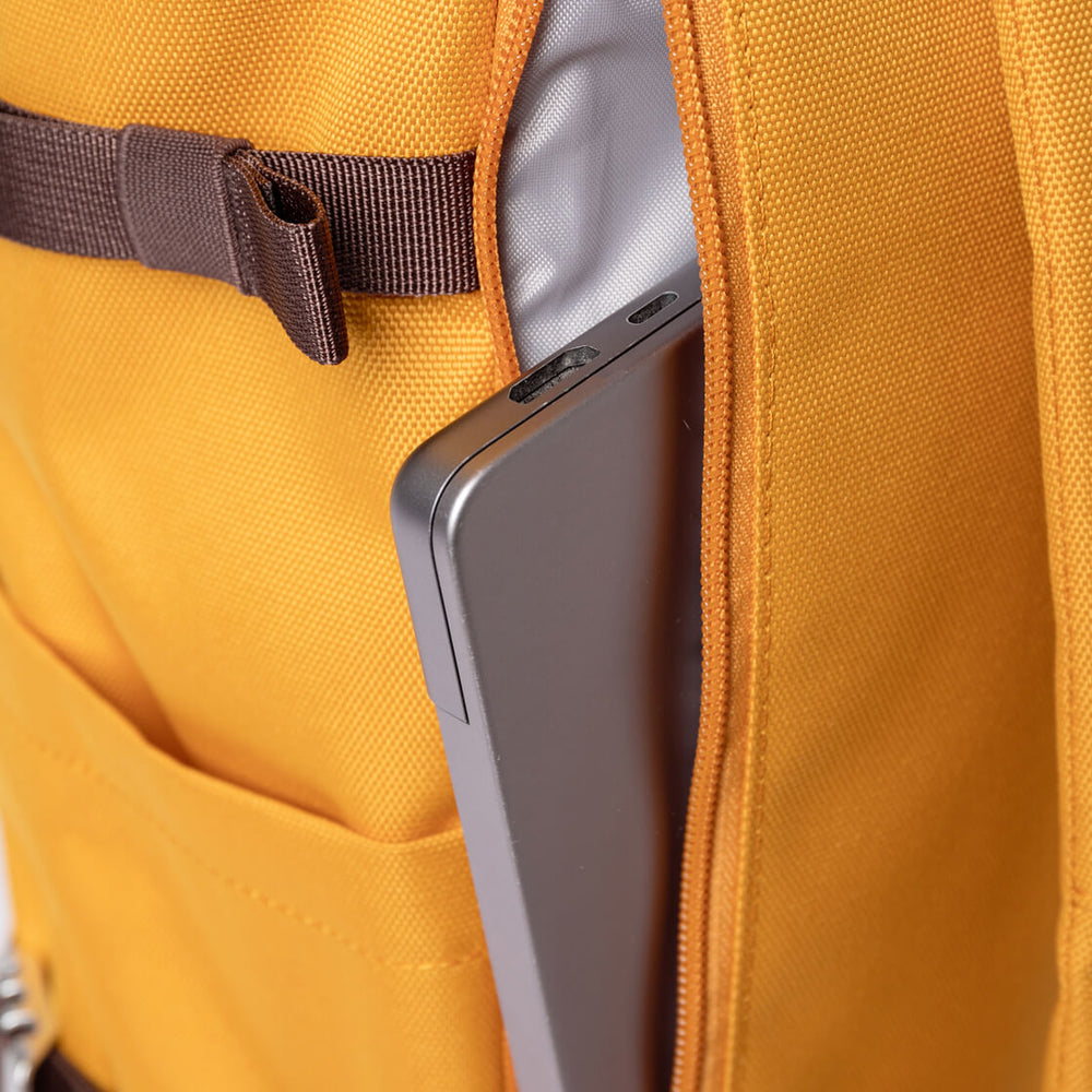 
                      
                        Sandqvist Backpack Rolltop L Icon yellow golden with natural leather
                      
                    
