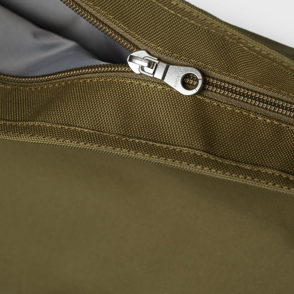 
                      
                        Sandqvist Backpack Rolltop M Icon beige olive drab with black leather
                      
                    