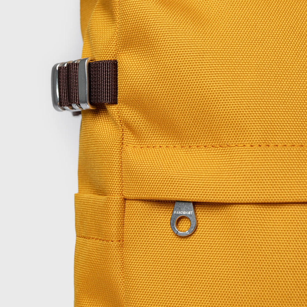 
                      
                        Sandqvist Backpack Rolltop M Icon yellow golden with natural leather
                      
                    