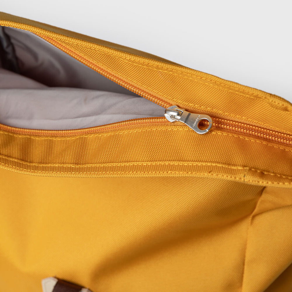 
                      
                        Sandqvist Backpack Rolltop M Icon yellow golden with natural leather
                      
                    